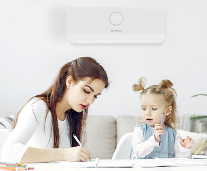 A wall-mounted Bosch air conditioning unit in a family home